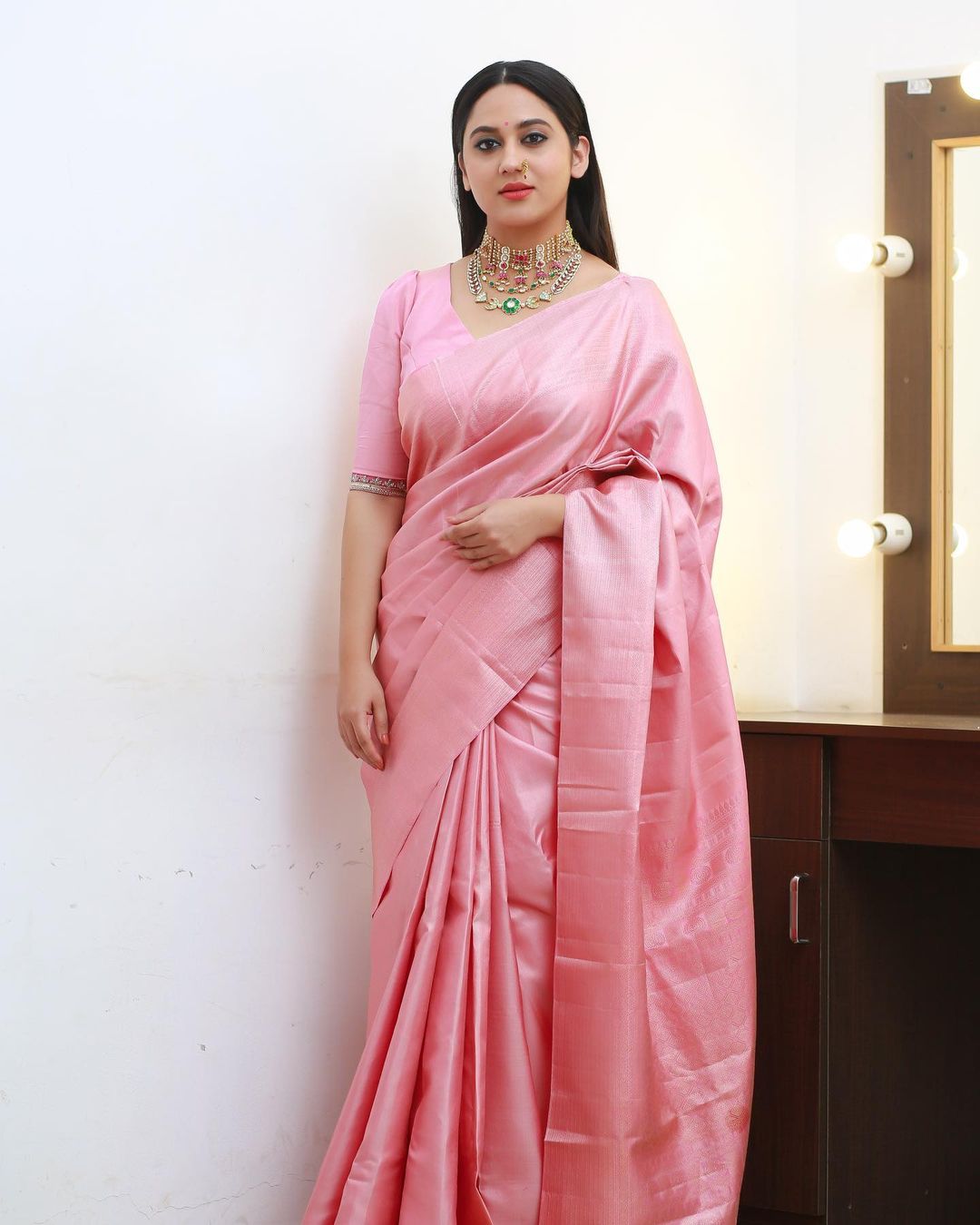 Malayalam Actress Miya George Beautiful jewelry in Pink Saree